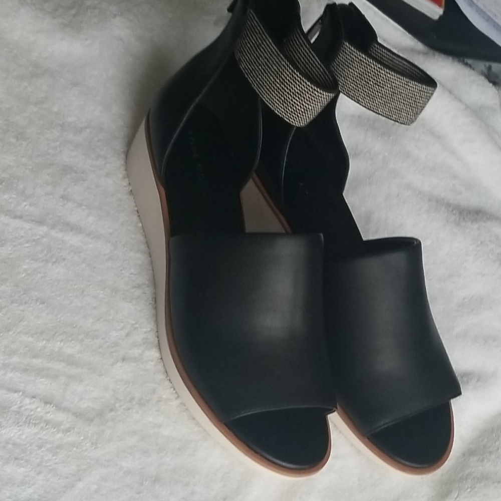 Black and white sandals.